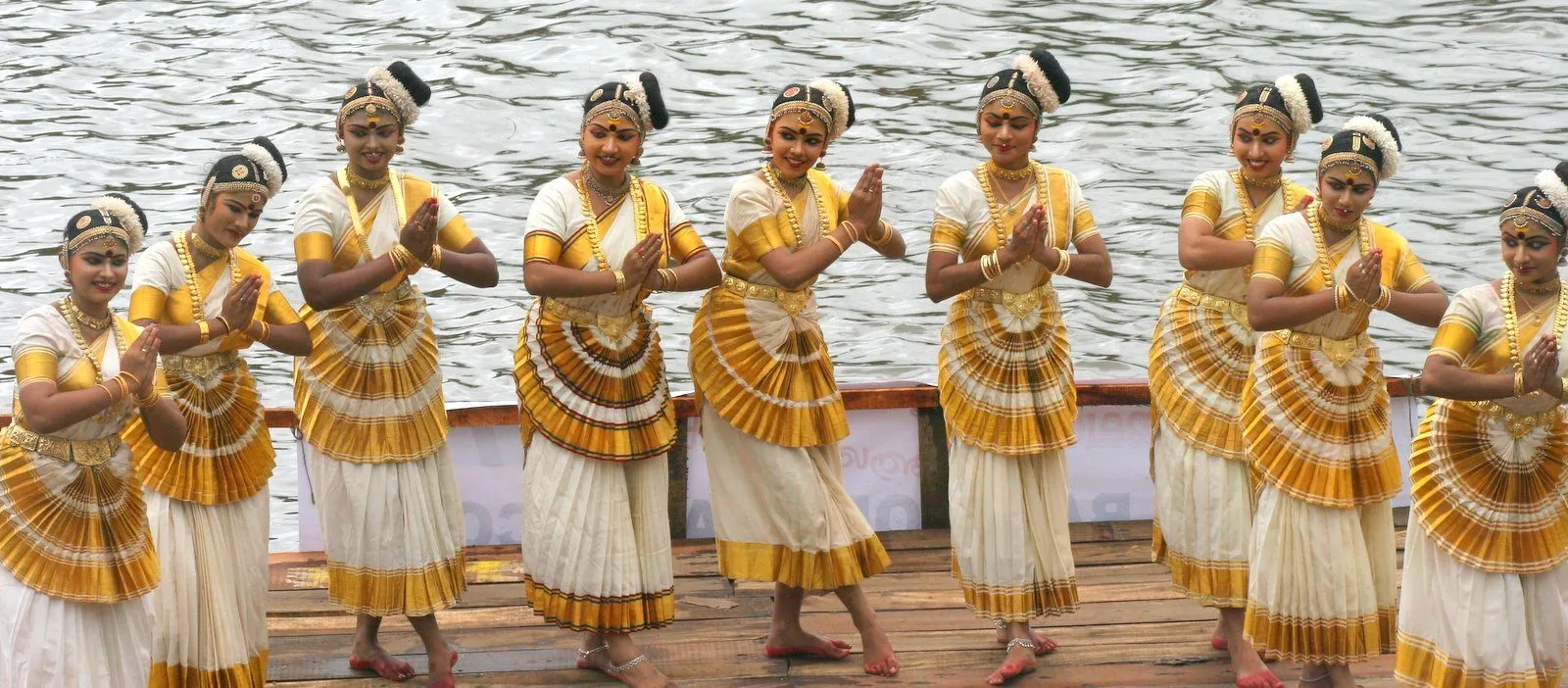 classical dance performance in Kerala with traditional costume and expressive makeup