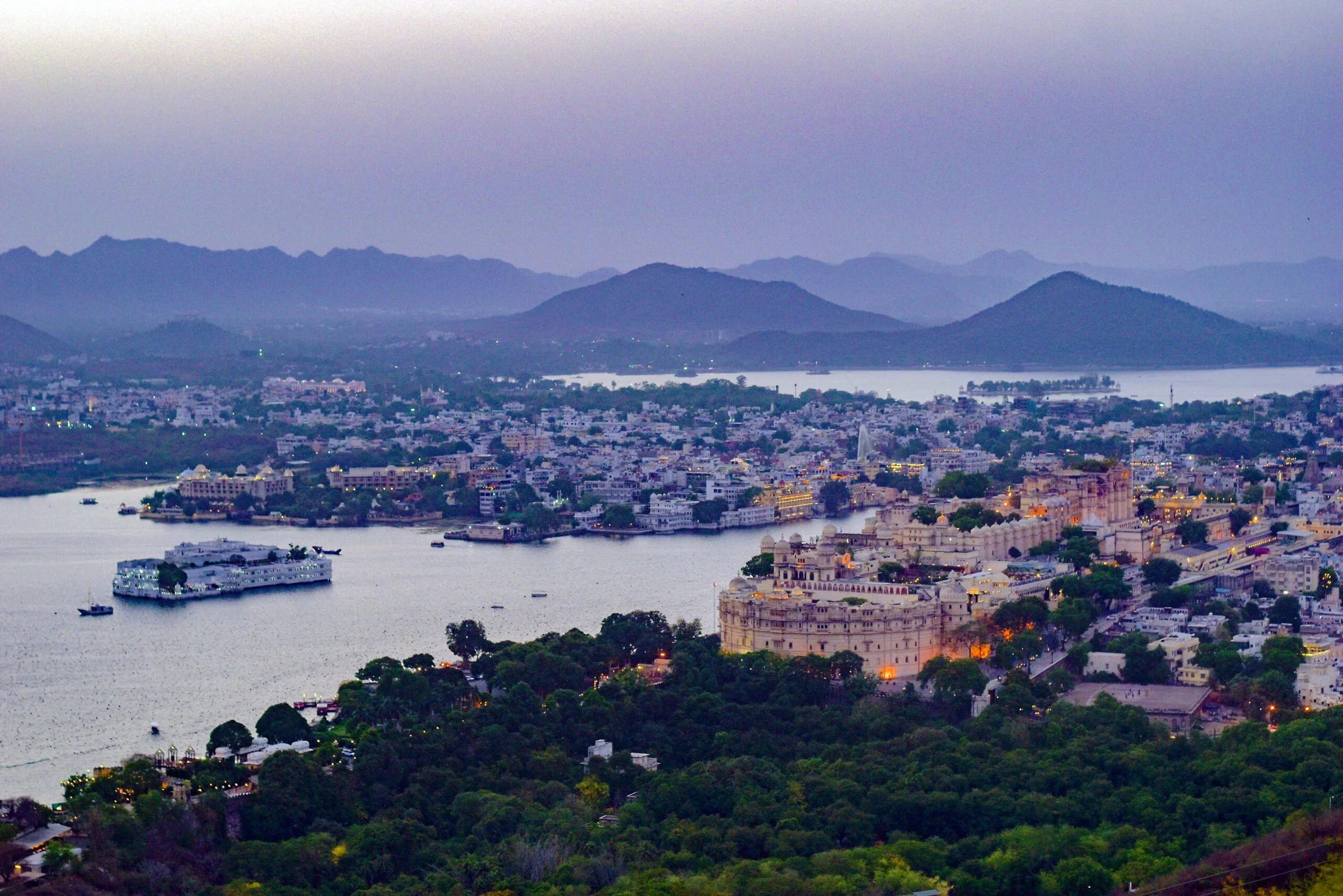 Udaipur city view with City Palace, Lake Pichola, and Jag Mandir island in Rajasthan
