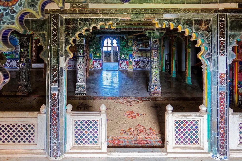 Juna Mahal Dungarpur showcasing historic Rajput architecture with intricate wall paintings and multi-storey palace structure
