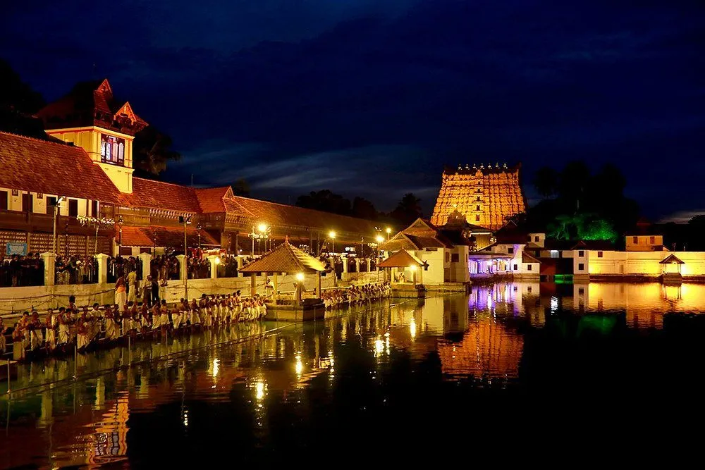 Sree Padmanabhaswamy Temple Trivandrum golden gopuram Dravidian architecture and sacred Hindu temple complex exterior view